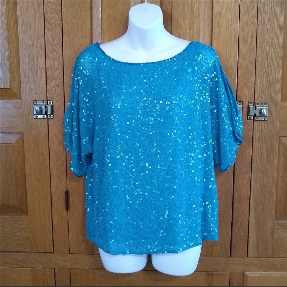 Damon's and Draper's bead & sequins cold shoulder top